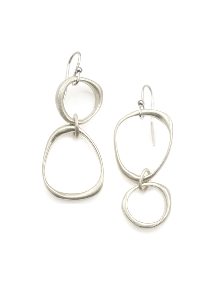 Philippa Roberts: Large and small organic circle. silver earrings