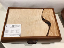 Wood included in this piece:  Bolivian Rosewood,  Curly Maple, Quilted Maple, Shedua, Wenge (Africa)